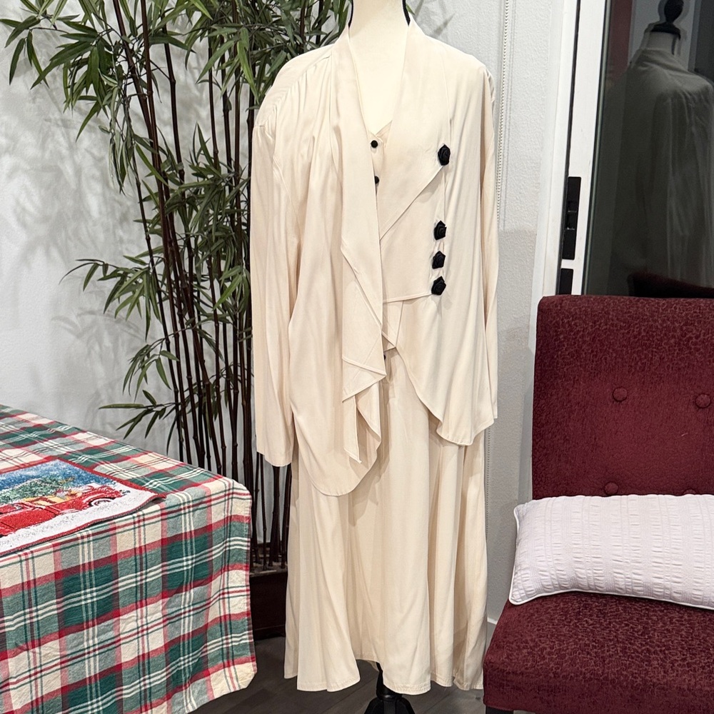 Elegant Cream Dress with Black Button Accents